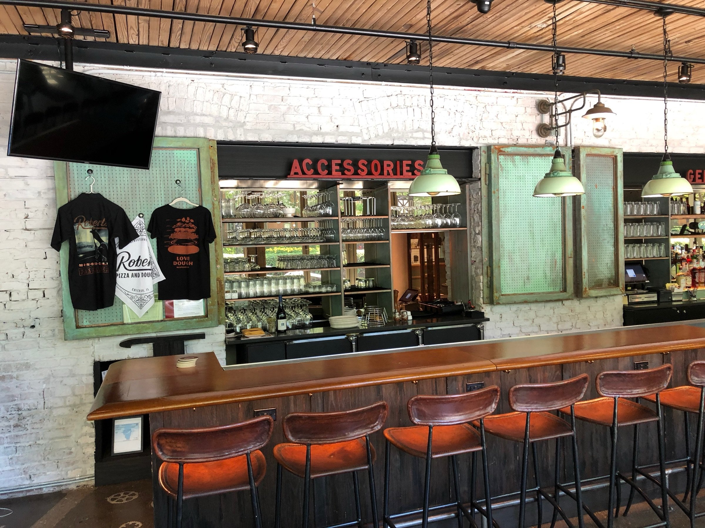 Entry view into Roberts Pizza showing the finished dining room and custom finish work