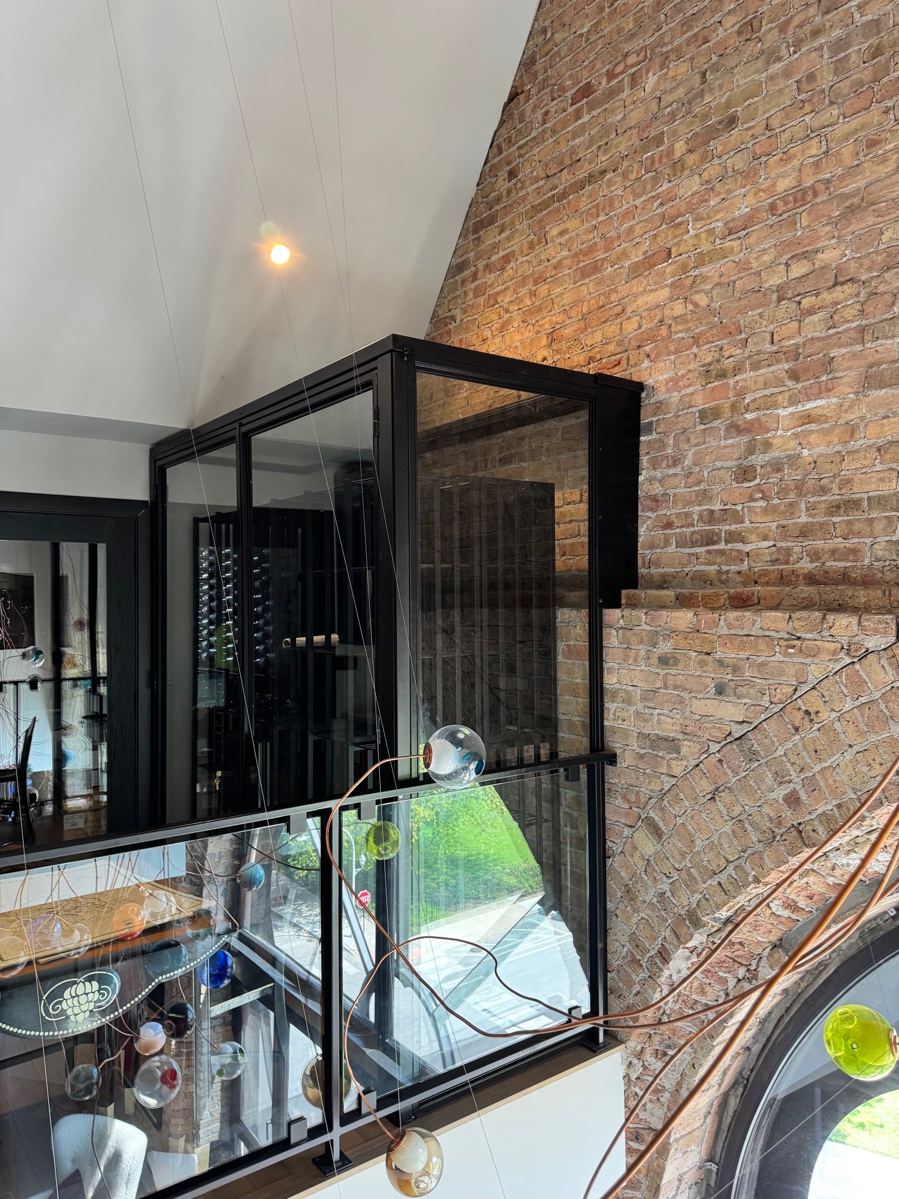 Close detail of the wine cellar door frame and hardware