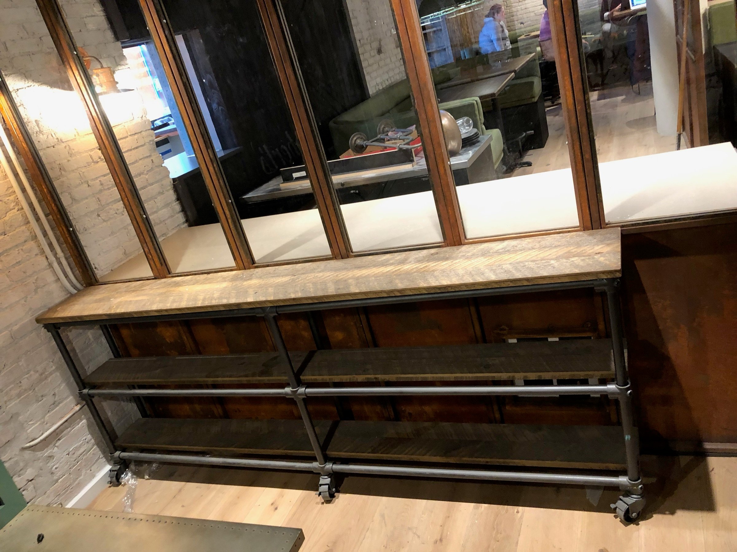 Custom steel-and-wood window detail at Roberts Pizza