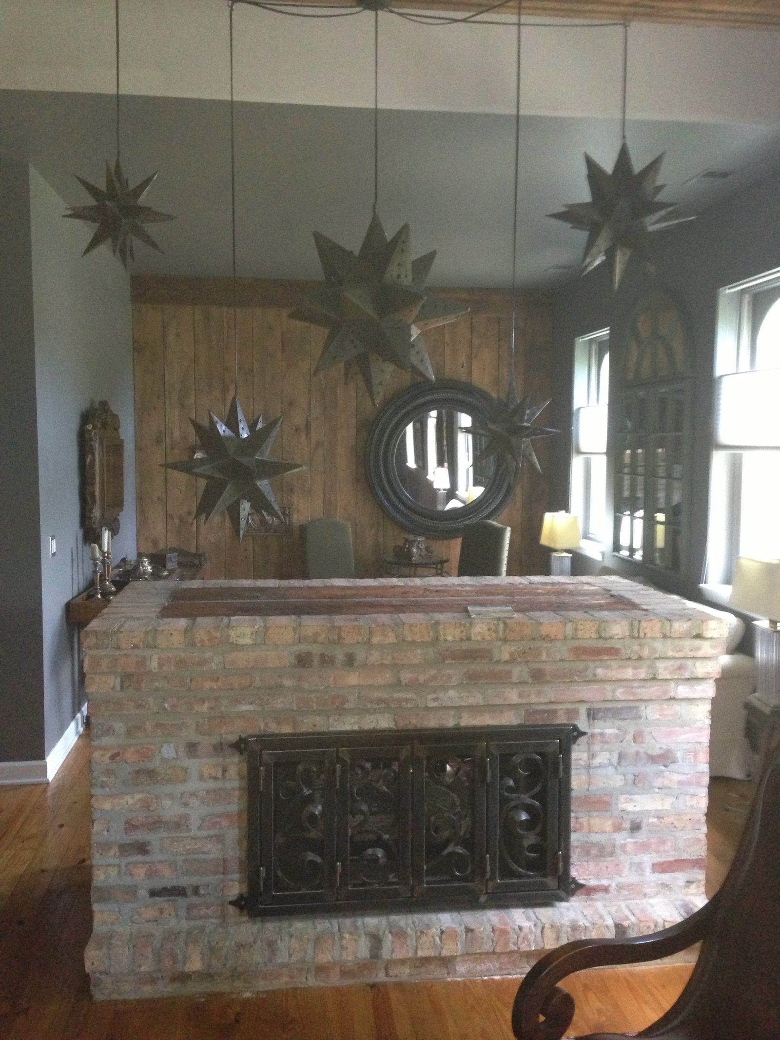 Custom metal fireplace surround in a traditional interior